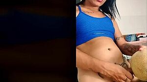 ts angelique monroe explores food fetish by fucking a melon and cumming