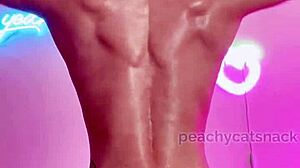 Petite asian muscle girl oils her tight body