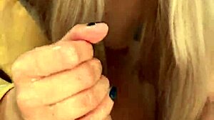 pretty milf amelie dubon gives close-up handjob to her friend in pov