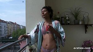 Sweet ebony amateur masturbates her hairy beaver on the balcony