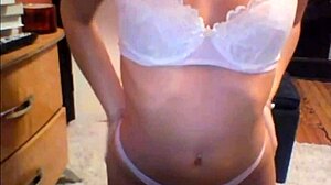 Hey, check out this sexy coed ripping clothes on cam for teasing striptease.