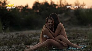 Teen Lesbians Engage In Outdoor Voyeur Sex On Grass