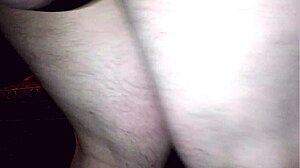 Intense bondage session with bound participants experiencing extreme restraint.