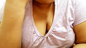 Sexy Asian girl flaunts her massive big boobs for you