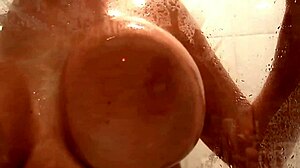 Nikki Benz soaps up her big tits! 😘💦