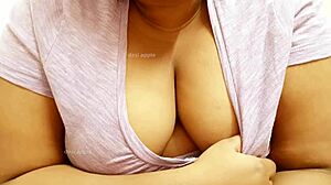 Sexy Asian girl flaunts her massive big boobs for you