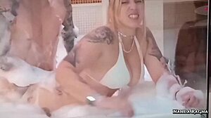 Is that cute tattooed babe moaning in hotel bathtub?