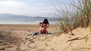 I filmed a curvy milf changing clothes and doing exercises on the beach