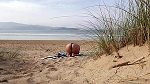 I filmed a curvy milf changing clothes and doing exercises on the beach