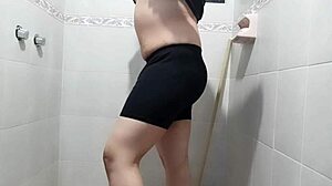 Person masturbates in the bathroom with a vibrator, part one.