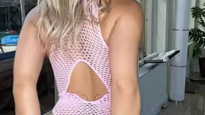 Luna Luxe rocks pink fishnet lingerie, looking smoking hot