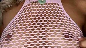 Luna Luxe rocks pink fishnet lingerie, looking smoking hot