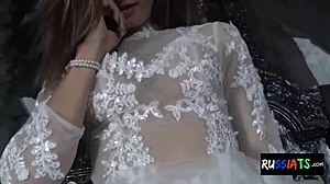 Russian shemale with big tits indulges in solo ass play with dildo.