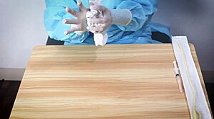in the hospital, the nurse dominates the patient with latex gloves