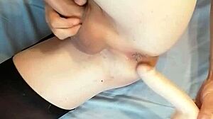 Sissy in pink takes intense anal dildo fucking and cumshot