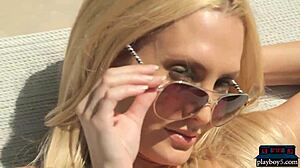 Perfect blonde MILF from Houston Texas undresses in hot photoshoot. Showing big tits and stripping clothes