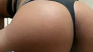 nelly teases with shaved asshole in black thong