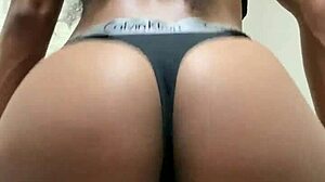 nelly teases with shaved asshole in black thong