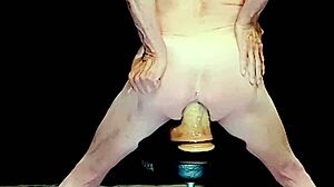 Submissive Gay Sissy Shemale Rides Big Dildo in Crossdressing Bareback Scene