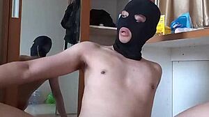 Sexy Gay in Red CD and Mask Plays Anal