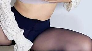 Siganjue prepares in front of mirror