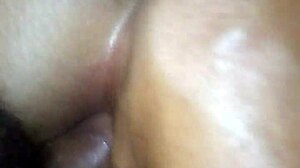 Amateur couple enjoys sideways anal sex in intimate moment
