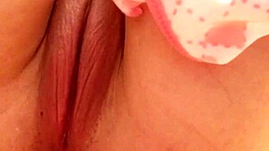 Solo Babe Spreads Wet Pussy Lips Close-Up