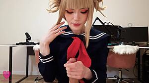 Himiko Toga from My Hero Academia in cosplay uniform enjoying a playful scene with riding and licking