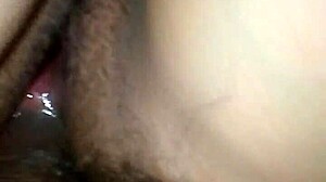 Amateur couple enjoys sideways anal sex in intimate moment