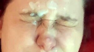 Amateur receives a surprising cumshot on her face.