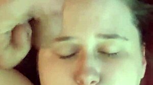 Amateur receives a surprising cumshot on her face.