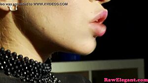 Glamcore latex lesbians toy each other closeup