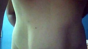 Young Couple Stands for Intimate Moment at Home