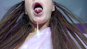 Fetish scene where she squirts in stockings, contrasting innocence and wildness.