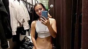 sexy brunette risks wild orgasms in fitting room. her shaved body trembles with thrill.