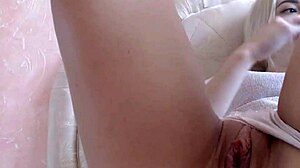 I watch this pretty blonde teen finger her pussy in homemade masturbation video