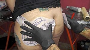 getting a new tattoo on my big fat ass at the shop
