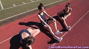 Athletic lesbian teens finger and lick at party