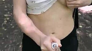 Anna Mole walks in nature with small tits in short shorts