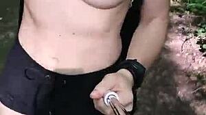 Anna Mole walks in nature with small tits in short shorts