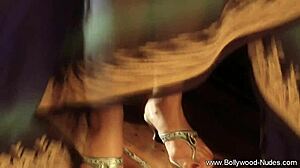 Bollywood actress performs a seductive striptease, undressing slowly