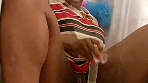 Ebony MILF Soaks Up Clothed Shower Fun with Toys