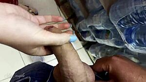 Risky public handjob leads to cumshot in supermarket