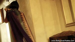 Bollywood actress performs a seductive striptease, undressing slowly