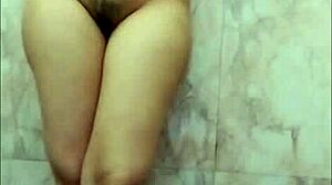 Hot Girl Fingers Herself in Steamy Bathroom!