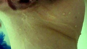 Close up teen 18+ shower with cream running down legs