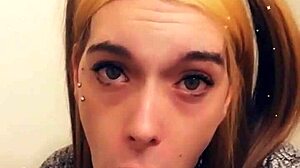 Pretty trans princess kneels to suck cock