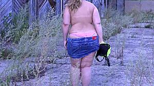 Curvy milf strips in public under short skirt.