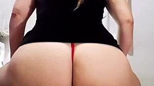 Look at this naughty slut smoking and stripping!