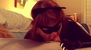 Hey, check out Catgranny blowing Batman in costume! 😺🦇